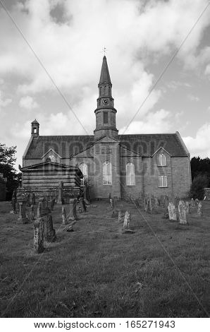 A view across the graveyard to the church at Methven