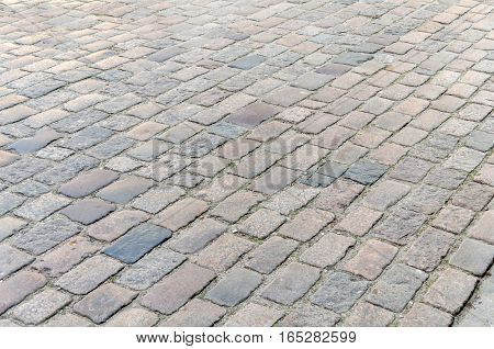 Cobblestone background street area texture close up
