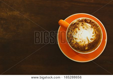 Coffee beats from above with wood bottom
