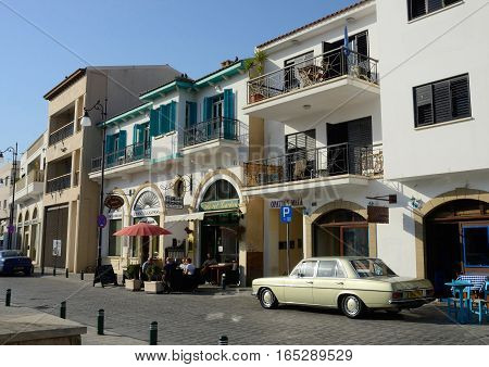 LARNACA CYPRUS - APRIL 7 2016:Shops cafesart galleries and restaurants in old town of Larnaca.It is city on southern coast of Cyprus