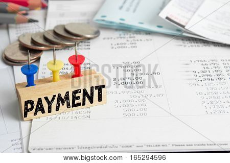 Text message Paymant on wooden with book back, Finance concept