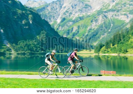 cycling seniors, by the vilsalpsee in austria