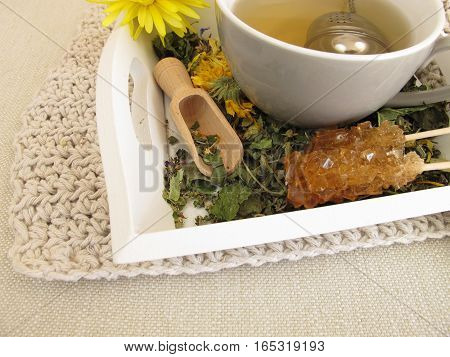 Herbal tea with marigold and cornflower with tea infuser ball