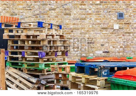 Pile of wooden pallets at a recycling yard