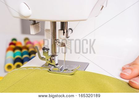 Seamstress Is Sewing On Sewing Machine