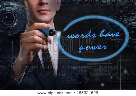 Business, Technology, Internet And Network Concept. Young Business Man Writing Word: Words Have Powe