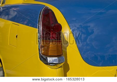 MOSCOW RUSSIA - OCTOBER 1 2016: Stoplight of the old egendary Soviet car Volga GAZ M-21. The car is painded as a police car.