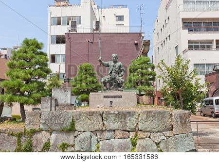 FUKUI JAPAN - AUGUST 02 2016: Statue of Shibata Katsuie on the ruins of Kitanosho castle in Fukui Japan. Katsue lost the Battle of Shizugatake in 1583 burnt the castle killed his wife and himself