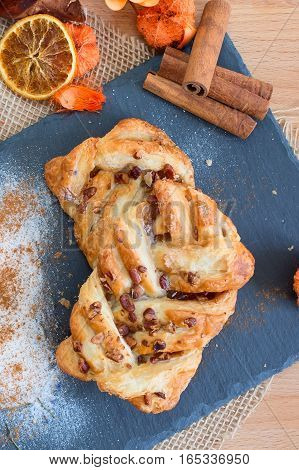 marple and pecan plait pastry sweet food breakfast with cinnamon