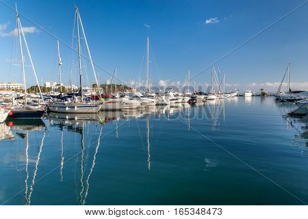 Boats and yachts moored up in a marina