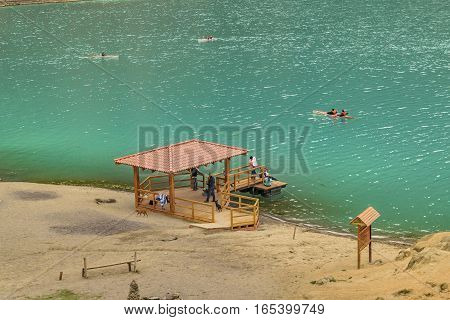 QUILOTOA, ECUADOR, FEBRAURY - 2016 - Aerial view of people at shore of Quilotoa lake Latacunga Ecuador