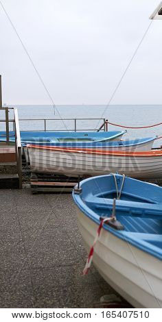 detail of same boats in a beach in arenzano