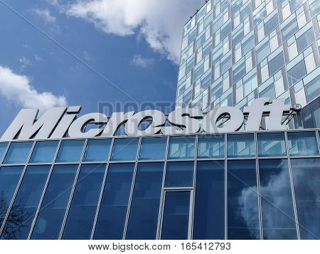 Bucharest Romania March 26 2016: Microsoft corporation office building facade with logo in Bucharest Romania. Microsoft Corporation is an American multinational technology company that develops and sells computer software and consumer electronics.