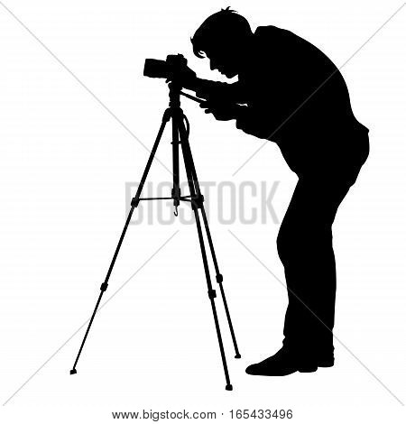 Cameraman with video camera. Silhouettes on white background. Vector illustration.