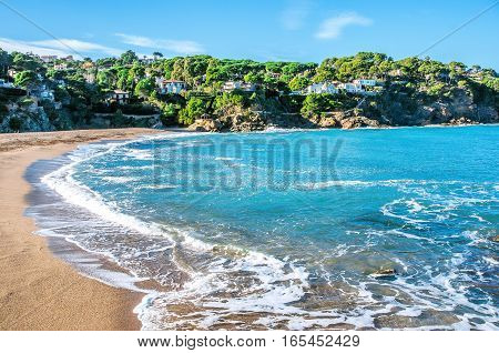 Spain. Catalonia. Costa Brava. Beach Sa Riera. Beautiful views of the Mediterranean coast. Tourist places. The picturesque promenade along the sea.