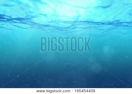 high quality deep blue ocean waves from underwater background with micro particles flowing light rays shining through