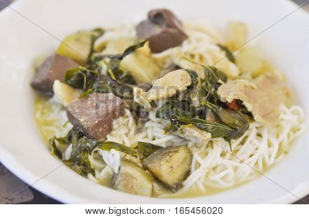 Thai noodle or northern Thai noodle with pork blood and eggplant dish