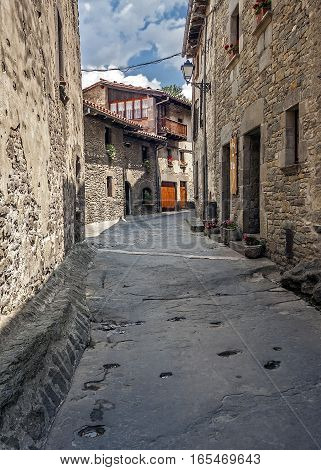 Spain Catalonia . Rupit - mountain village built on top of the basalt rocks in the national park of volcanic origin. Covering many ancient streets - frozen lava.