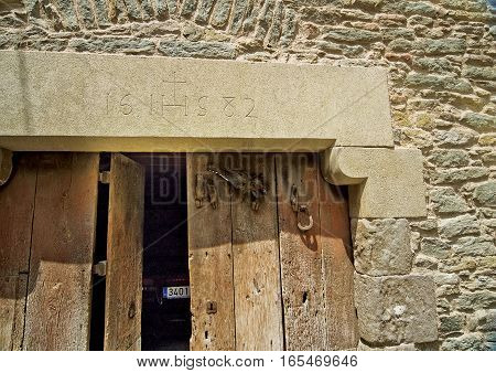 Spain Catalonia . Rupit - mountain village built on top of the basalt rocks; details of facades of the fourteenth to sixteenth centuries.