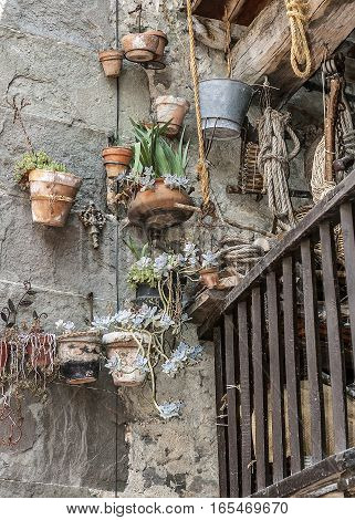 Spain Catalonia . Rupit - medieval mountain village built on top of the basalt rocks in the national park of volcanic origin. The colorful balconies locals.