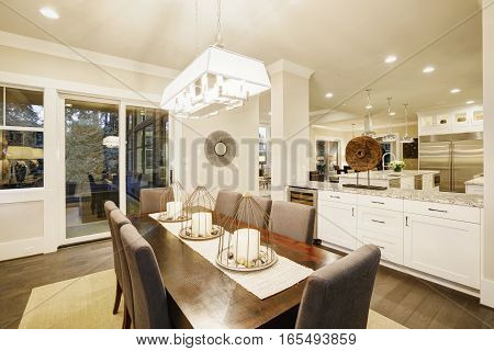 Lovely Dining Room With Rectangular Table And Grey Chairs