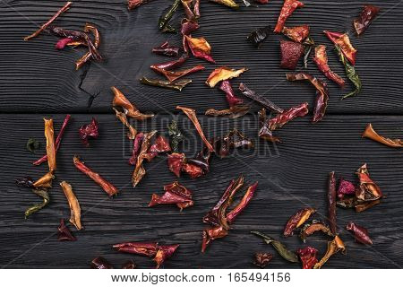 dark wooden texture background with dried pepper