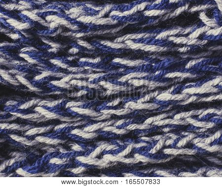 Blue knitted fabric texture. backhround or texture
