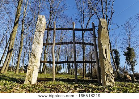 wooden gate in the nature under blue sky