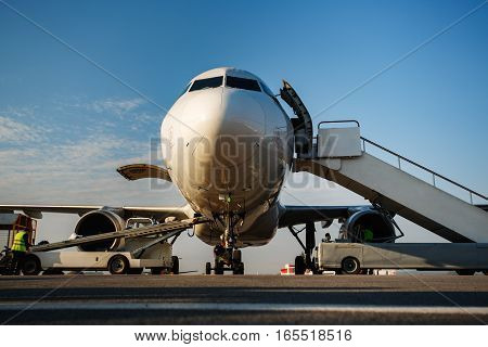 Baggage Is Loading Into Of The Aircraft