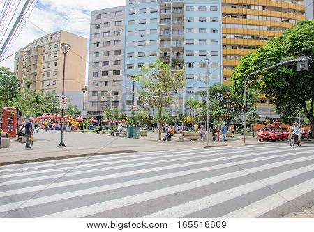 Londrina PR Brazil - December 23 2016: Downtown of Londrina. People walking between the downtown shops. Street called Calcadao destined to commerce and leisure.