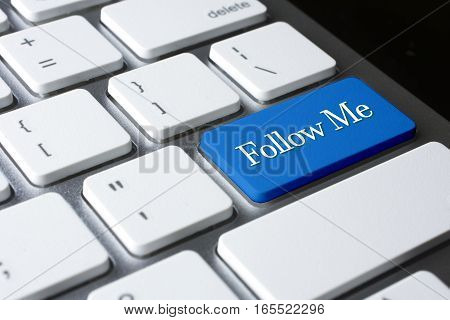 Follow Me  word on blue color enter keyboard