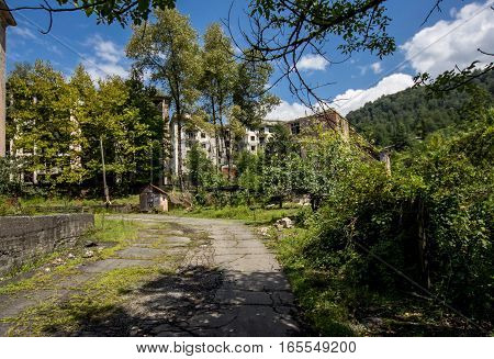 Abandoned mining ghost-town Polyana, Abkhazia. Destroyed empty houses, remnant of The Georgian-Abkhazian war