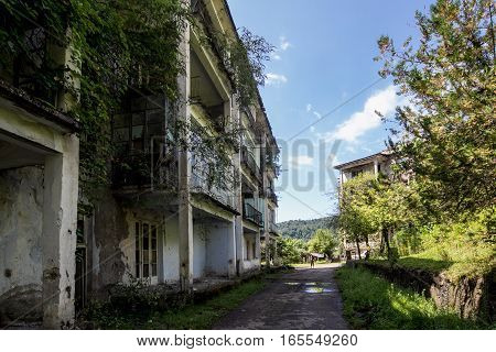 Abandoned mining ghost-town Polyana, Abkhazia. Destroyed empty houses, remnant of The Georgian-Abkhazian war