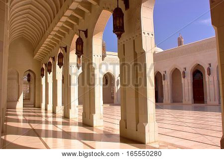 MUSCAT, OMAN: courtyard with arcades at Sultan Qaboos Grand Mosque