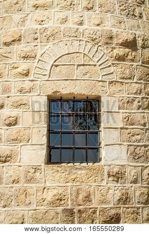 Barred window Montefiore Windmill in Jerusalem Israel