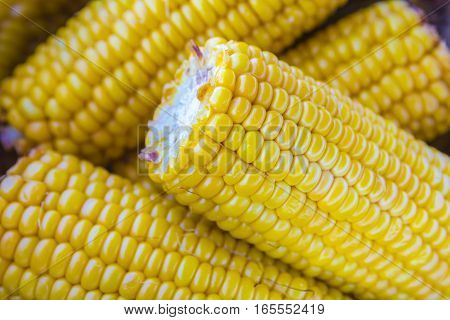 stack of grilled sweet corn on the cob