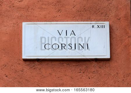 Via Corsini, street plate on a wall of old house in Trastevere district, Rome, Italy