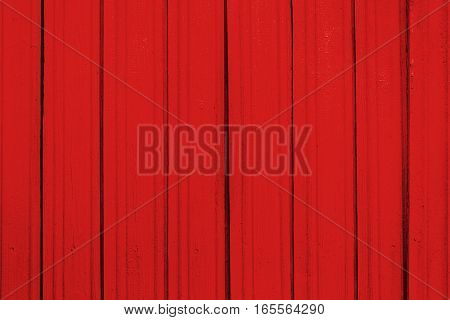 Texture of old wooden planks with peeling color paint