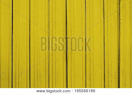 Texture of old wooden planks with peeling color paint