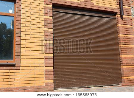 House Garage Door Installation. Close up on new garage door.