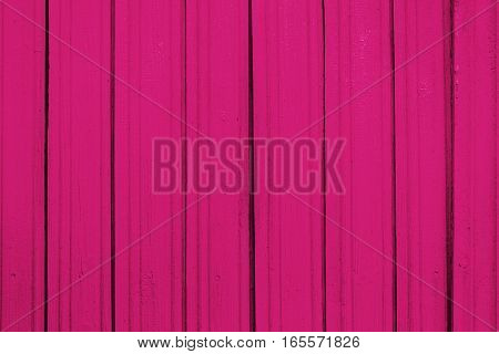 Texture of old wooden planks with peeling color paint