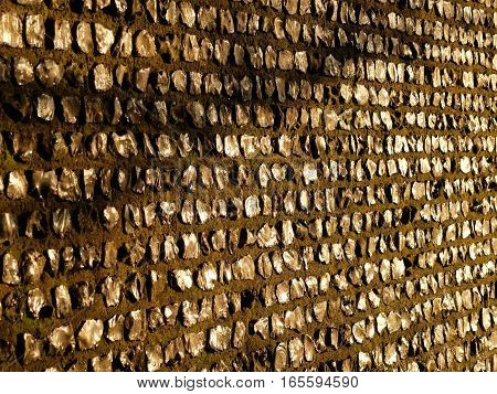 A Knapped Flint Wall In Warm Sunlight