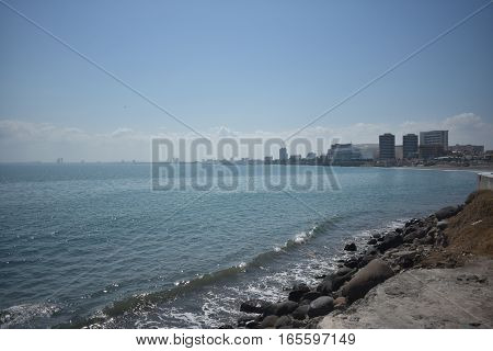 Ocean view and condominiums from the shore of the port of veracruz