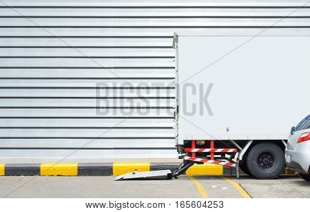 Delivery truck and transportation car concept - Delivery truck parking for delivery post box to receiver on footpath and copyspace