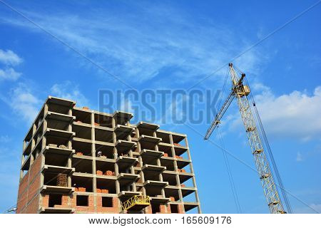 Crane Construction with blue sky  as a background