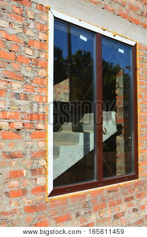 Window installation and Replacement Details with Concrete Lintel. Window Construction with Insulation.