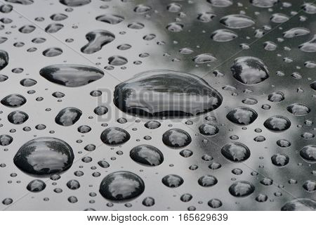 Water drop on the black Metal surface