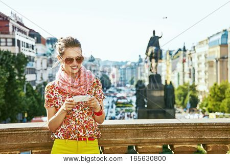 Traveller Woman On Vaclavske Namesti In Prague Writing Sms