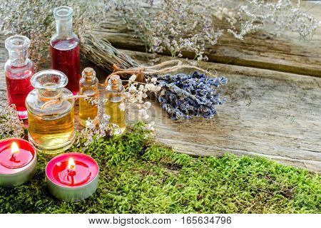 Bunch Of Dry Lavender, Candles And Bottles Of Scented Oil.