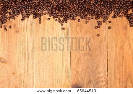 Coffee Background. Heap Roasted Coffee Beans Spread Over On Table